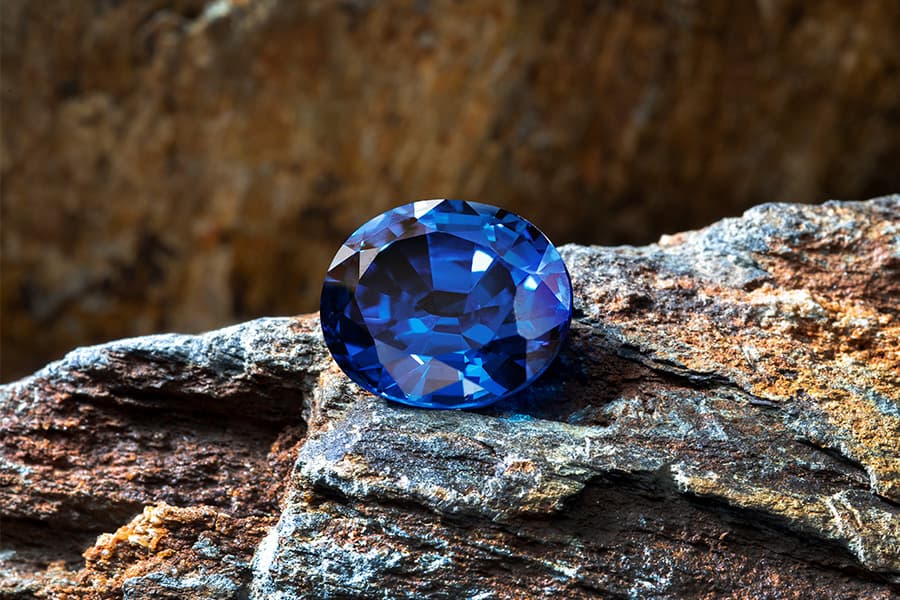 An unheated Kashmir sapphire, oval cut, displaying deep cornflower-blue saturation